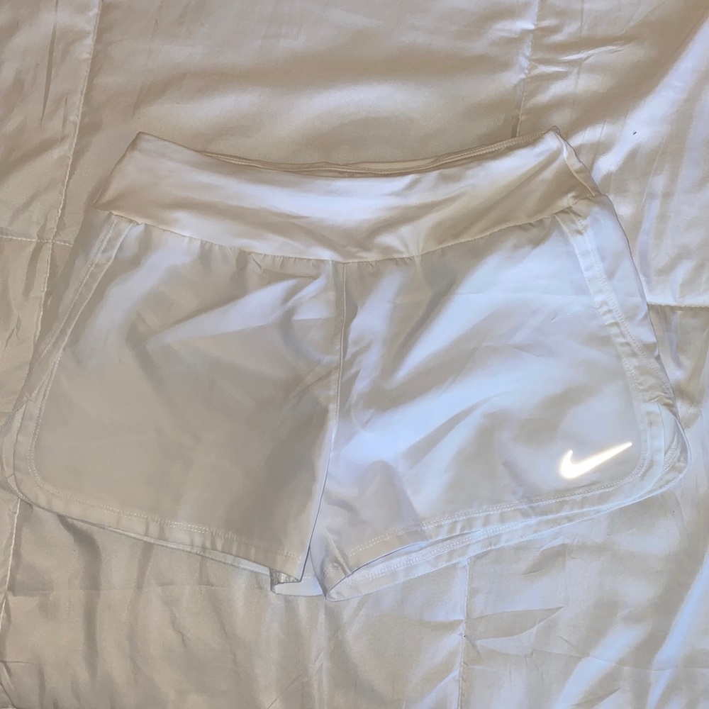White Nike athletic shorts